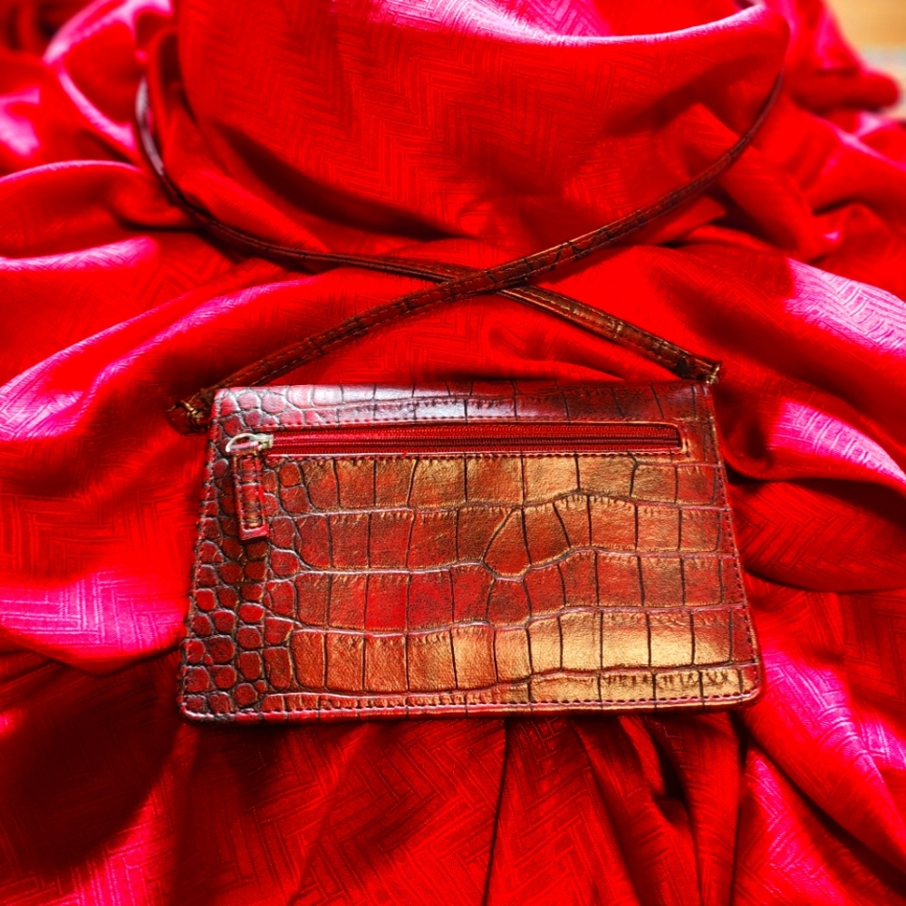 Clutch with strap